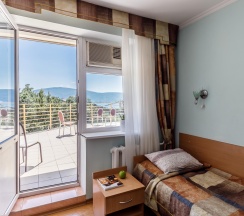 Номер стандарт семейный с 4 односпальными кроватями в Villa Victoria