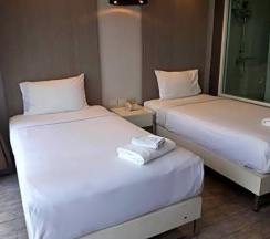 Двухместный номер Deluxe 2 отдельные кровати в Inn Place Serviced Residence
