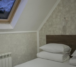 Номер стандарт с 1 двуспальной кроватью (мансарда) в Альпина