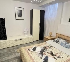 Номер улучшенный с 1 двуспальной кроватью (цокольный этаж) в Kovensky