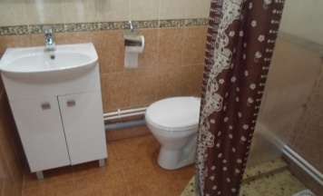 Номер эконом с 2 односпальными кроватями с балконом (удобства на этажа) в Ламберт