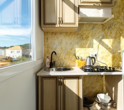 Четырехместный номер с кухней в Морской ветер