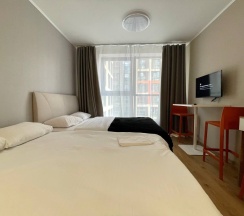 Апартаменты в ЖК "START"  (спальные места 2+2), (Метро Парнас, 15 минут пешком) в Rauktis apartments