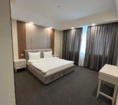 Двухместный люкс двуспальная кровать в Hotel Almaty MV Residence