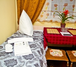 Номер комфорт с 4 односпальными кроватями в Home Hotel