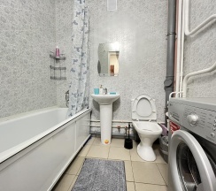 Апартаменты стандарт с двуспальной кроватью и креслом диваном в Апартаменты NHome