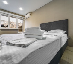 Комфорт №15 с террасой в Портал Апартментс