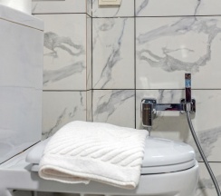 Двухместные Люкс Апартаменты с кухней с 2 комнатами двуспальная кровать в Гости Кавказа