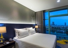 Двухместный номер Deluxe с красивым видом из окна двуспальная кровать в Chatrium Hotel Riverside Bangkok