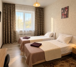Номер стандарт с 2 односпальными кроватями в Long House