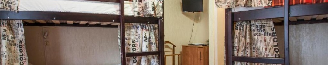 Кровать в 6-местном общем номере в Лут