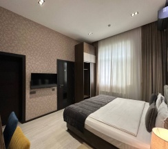 Двухместный номер Deluxe двуспальная кровать в Home Hotel