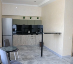 Двухместный семейный люкс с балконом и с красивым видом из окна двуспальная кровать в Вилла Абхазия