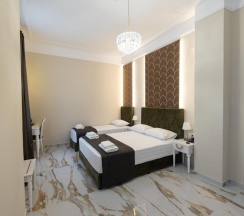 Трёхместный номер Deluxe в Modern Luxury Hotel