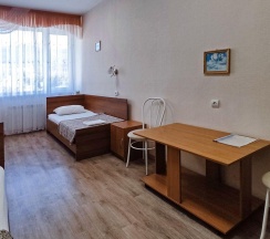 Кровать в 3-местном общем номере в Smart Hotel KDO Миасс