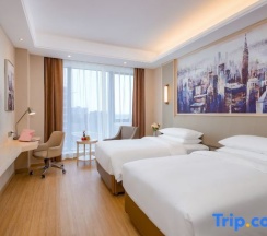 Двухместный номер Deluxe 2 отдельные кровати в Changxing Vienna International Hotel