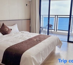 Двухместный номер Standard с балконом и с видом на море двуспальная кровать в Taishan Golden Beach Resort