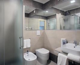Трёхместный номер в Le Ginestre Family Wellness Hotel