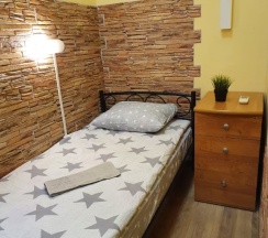 Кровать в общем номере в Ideal home