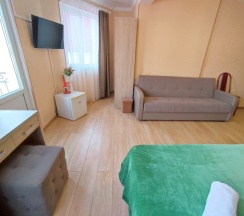 Семейный номер с балконом для 4х гостей (возможно доп. место) в Ника