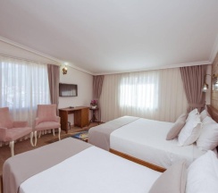 Трёхместный номер Superior в Infinity City Hotel