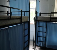Кровать в общем номере с 2-двухъярусными кроватями в Отель на Тимирязевской