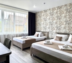 Трехместная комната комфорт в Корнилофф от Травел Хотелс Антураж