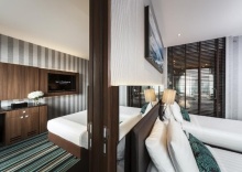 Четырёхместный номер Stay Connected в The Continent Hotel Sukhumvit / Asok BTS Bangkok by Compass Hospitality