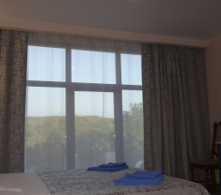 Четырёхместный номер Comfort двуспальная кровать в Green hills