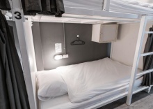 Кровать в общем номере в The Cocoon Hostel