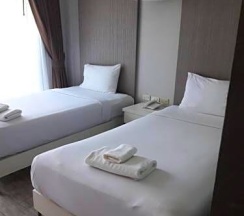 Двухместный номер Deluxe 2 отдельные кровати в Inn Place Serviced Residence
