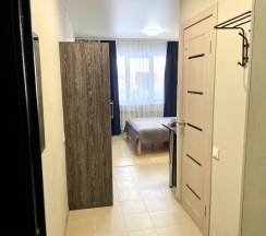 Двухместная студия Comfort (двуспальная кровать) в Апартаменты с балконом и видом На Сутки