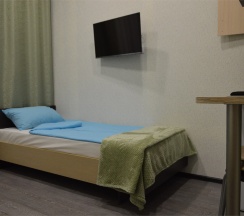 Комната с 2-мя односпальными кроватями и кресло-кровать в Календарь