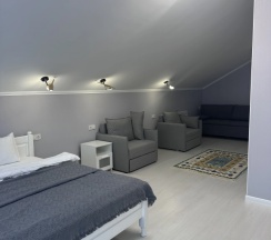 Четырёхместный номер Улучшенный с красивым видом из окна в В моменте