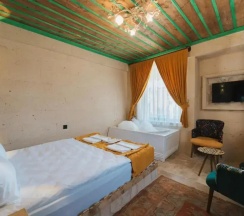 Двухместный люкс двуспальная кровать в La Casa Cave