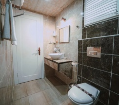 Апартаменты Comfort в Voswos Garage Coffee & Hotel