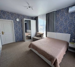 Двухместные апартаменты двуспальная кровать в Мелис