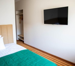 Номер улучшенный стандарт с 1 односпальной кроватью в Хабаровск