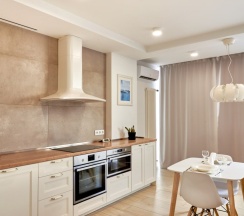 Двухместный люкс двуспальная кровать в Апартаменты Румер в современном жилом комплексе у ТЦ Дана Молл