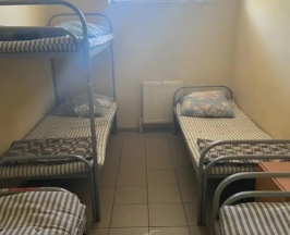 Кровать в общем номере (общая ванная комната) в Чкалофф