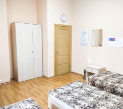 Кровать в 3-местном общем номере в Smart Hotel KDO Саранск