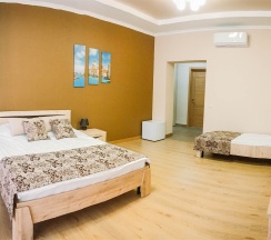 Бизнес/Семейный Двухместный 2+1 "Business/Family Double 2+1" в Огни