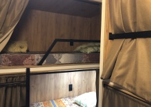 Кровать в общем номере в Sleepbox