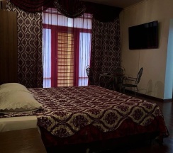 2-местный 1-комнатный номер полулюкс с 1 двуспальной кроватью в Адам