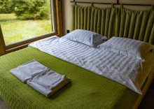 Коттедж стандарт с 4 односпальными и 3 двуспальными кроватями в Berta
