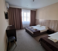 Номер стандарт семейный с 1 односпальной и 1 двуспальной кроватью в Leto Place