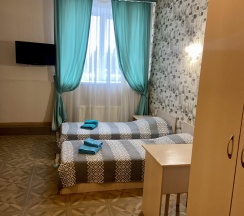 Номер комфорт с 4 односпальными кроватями в Залесный