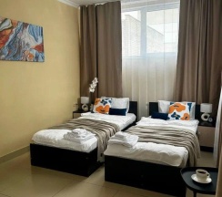 Номер стандарт комфорт с 2 односпальными кроватями в Дисней