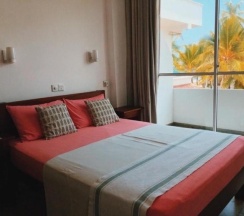 Двухместный номер Standard с балконом двуспальная кровать в Jasmine Garden Beach Guest House